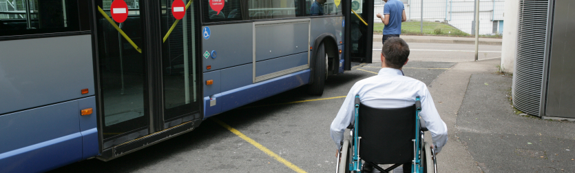 Bus and wheel chair user Adobe Stock