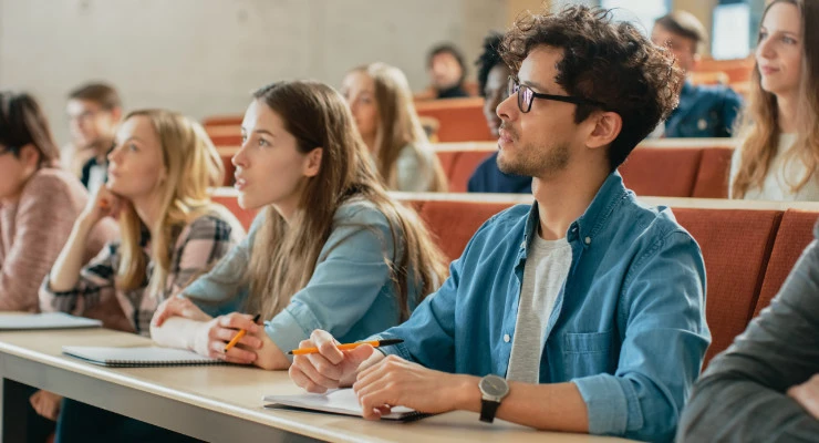 Young people at lecture theatre