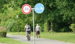 Cyclist and walker AdobeStock 161665960