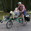 Picture of two people on bike
