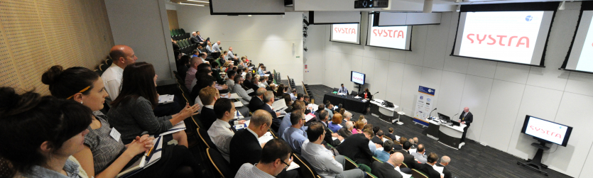 Opening plenary with SYSTRA Logo showing