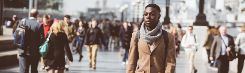 Pedestrians and black guyAdobeStock 80846001